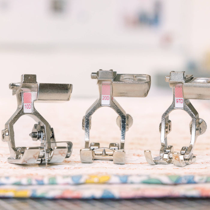 Three additional presser feet included with the BERNINA 580 Liberty Edition