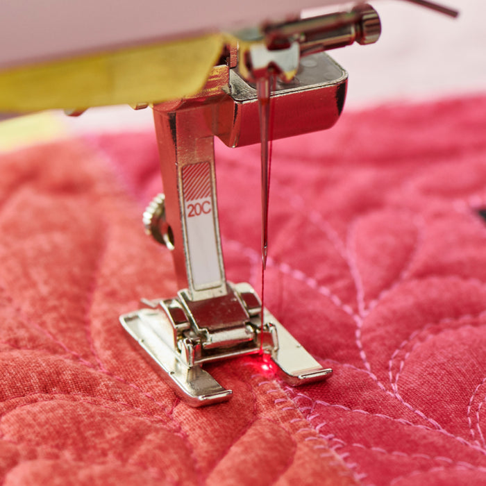 BERNINA Pinpoint Laser on the BERNINA 790 ULTRA marking the exact needle entry point
